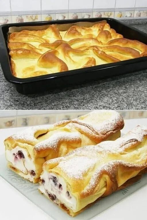 Ruladă pufoasă cu cremă fină de brânză și afine